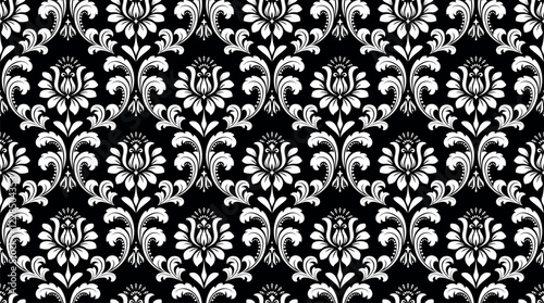 Wallpaper in the style of Baroque. Seamless vector background. White and black floral ornament. Graphic pattern for fabric, wallpaper, packaging. Ornate Damask flower ornament