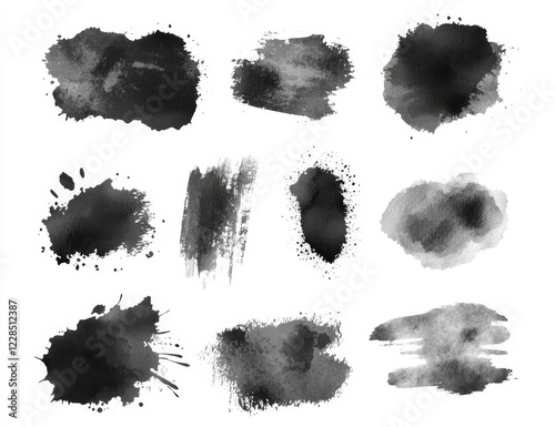 Twelve black watercolor paint splatters and brush strokes isolated on white background.