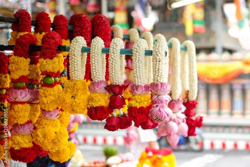 Flower garlands of marigold, jasmine, roses, lotus flowers for sale in front of Sri Maha Mariamman (or Maha Uma Devi Temple, Wat Phra Si Maha Umathewi or Wat Khaek) Tamil Hindu Temple - Si Lom Road photo