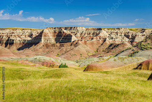 Rugged multi color plains, mountains and valleys of Badlands National Park near Wall, South Dakota photo