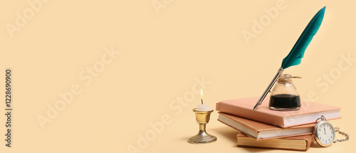 Books, nib pen, inkwell, candle and pocket watch on beige background with space for text photo