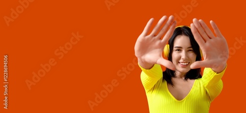Happy young woman in headph...