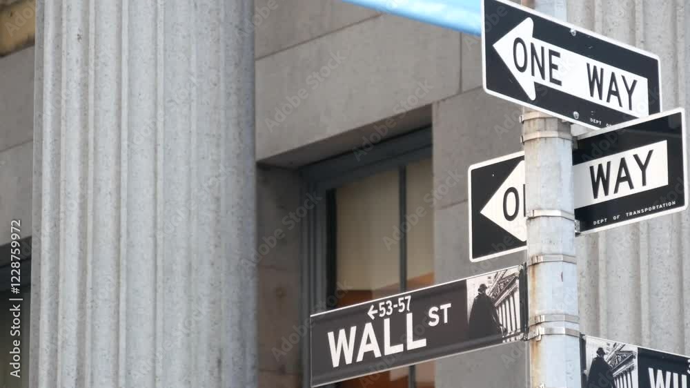 New York City United States. Lower Manhattan Downtown Financial District urban architecture. American Wall street road sign near Stock Exchange building, USA Stock Market. One way traffic arrow sign. New York City United States. Lower Manhattan Downtown Financial District urban architecture. American Wall street road sign near Stock Exchange building, USA Stock Market. One way traffic arrow sign.