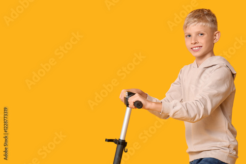 Cute boy with modern electr...