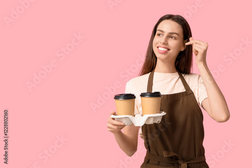 Young female barista with c...