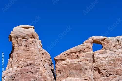 A small arch in a rock formation above Notom Road in the Grand Staircase-Escalante National Monument, Utah, USA photo