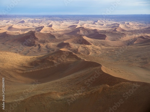 Aerial, view of sand dunes, Kulala Wilderness Reserve on the edge of the Namib Desert, Tsaris Mountains, Sossosvley Region Hardap, Namibia, Africa photo