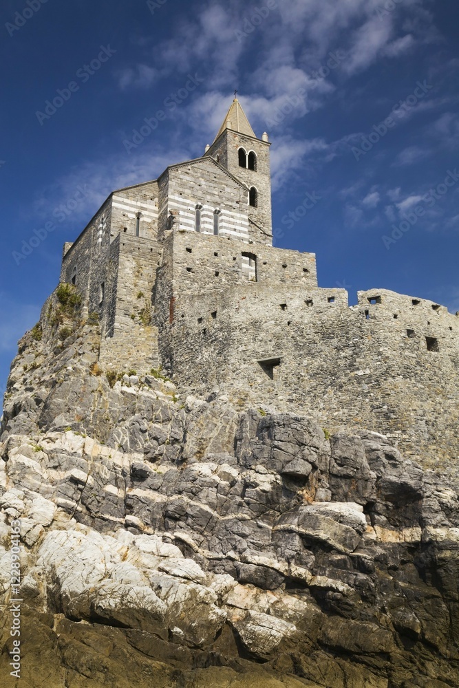 Medieval fortress walls and church of St. Peter, Portovenere, La Spezia province, Italy, Europe Medieval fortress walls and church of St. Peter, Portovenere, La Spezia province, Italy, Europe