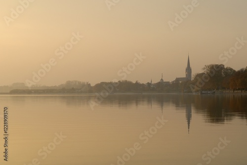 Foggy sunset near the city of radolfzell - Baden Wuerttemberg Germany Europe. photo