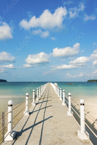 Pier on beach with turquoise water at Saracen Bay on Koh Rong Sanloem island, Krong Preah Sihanouk, Sihanoukville, Cambodia, Asia photo