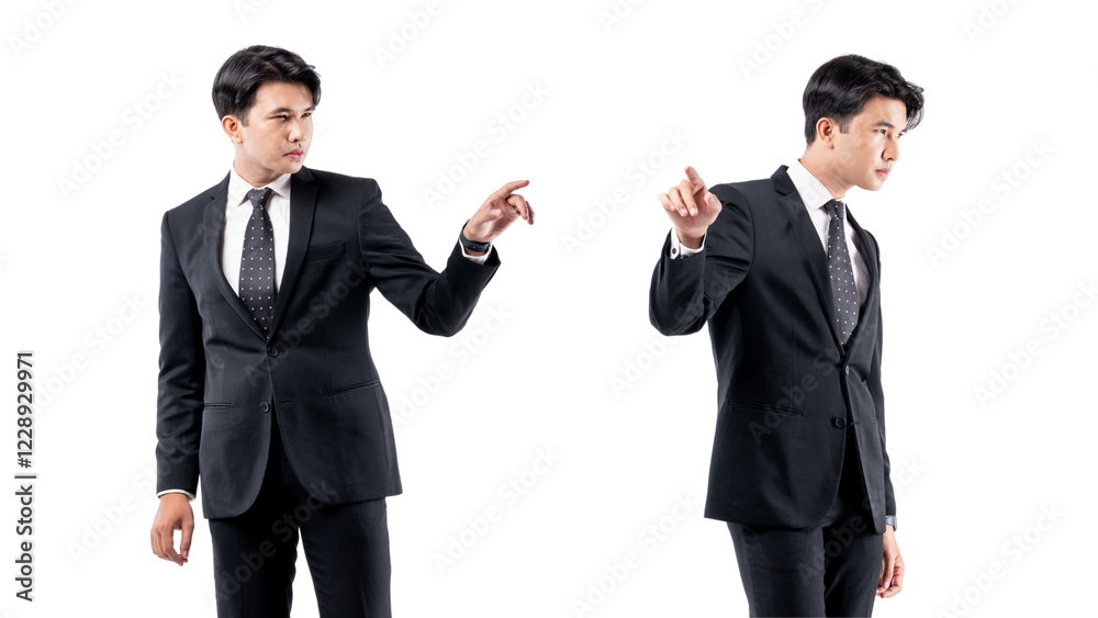 A man in a black suit and tie stands in front of a white background A man in a black suit and tie stands in front of a white background