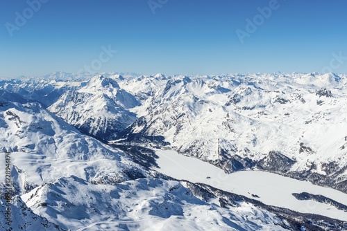 View of Lake Sils from Corvatsch, mountains in winter, Swiss Alps, Engadin, Canton of Graubünden, Switzerland, Europe photo