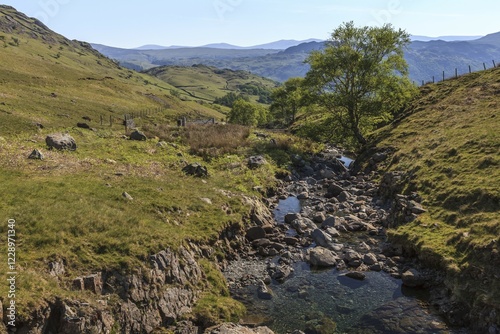 Mountain stream on the Honister Pass in Borrowdale, Lake District National Park, Cumbria, England, United Kingdom, Europe photo