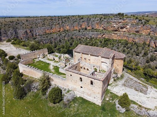 Historic ruin in a rocky landscape with river and dense vegetation, bird's eye view, aerial view, gorge, Natural Park of the Gorges of the Duratón River, Duraton, Parque Natural de las Hoces del Río Duratón, Ermita de San Frutos, Segovia, Valladolid, Castilla y León, Spain, AI generated, Europe photo