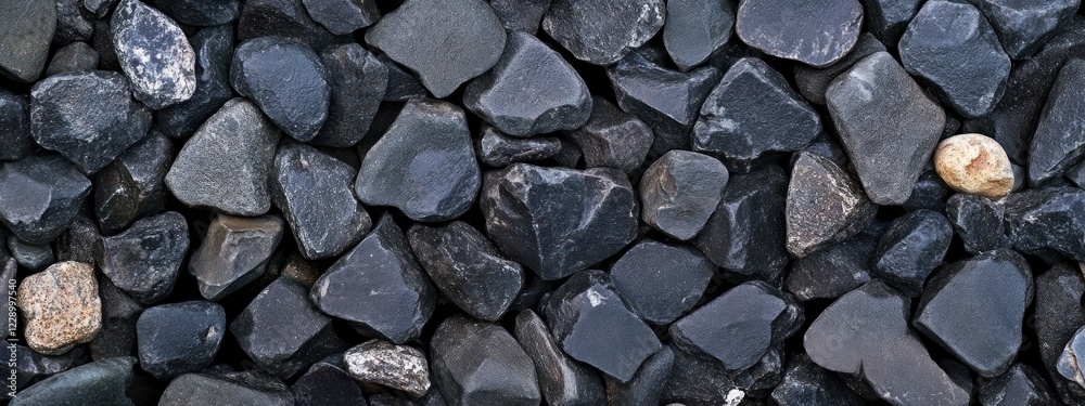 Close-up of dark grey and black pebbles. Close-up of dark grey and black pebbles.