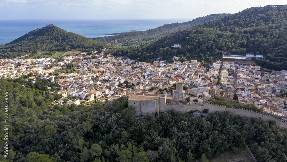 Drone shot, city view with Castell de Capdepera, Capdepera, Majorca, Balearic Islands, Spain, Europe Drone shot, city view with Castell de Capdepera, Capdepera, Majorca, Balearic Islands, Spain, Europe