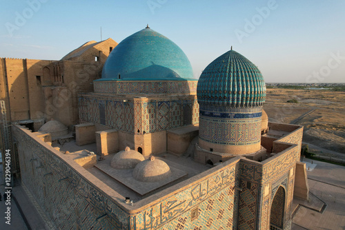 Ahmet Yesevi Tomb was built by Timur in 1389. The entrance gate and garden of the social complex. Arabic verses are written on the bottom of the dome.