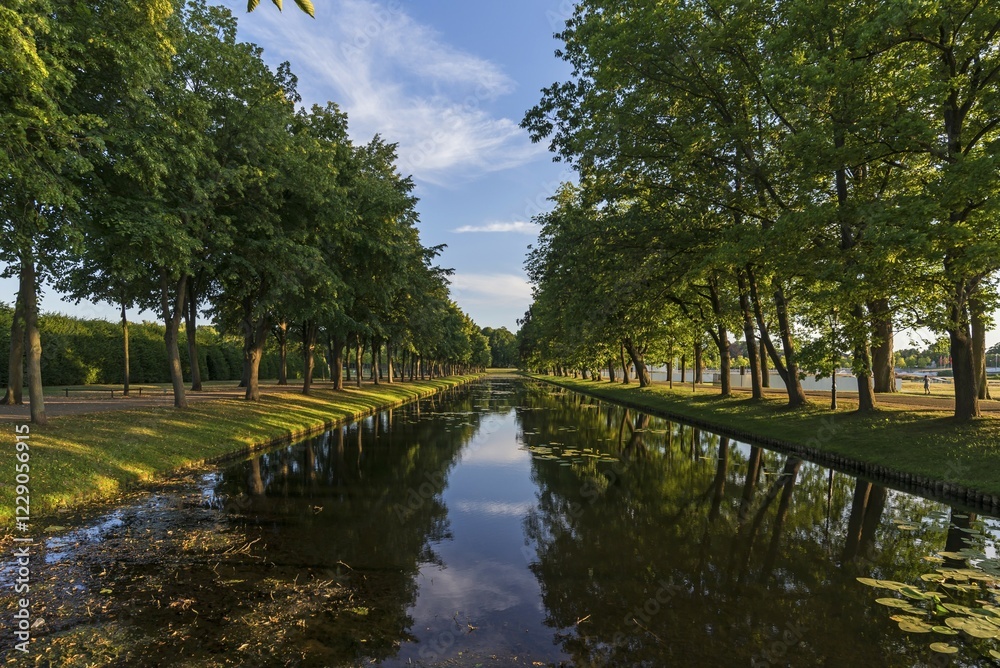 Schwerin castle garden with moat in the evening light, Schwerin, Mecklenburg-Western Pomerania, Germany, Europe Schwerin castle garden with moat in the evening light, Schwerin, Mecklenburg-Western Pomerania, Germany, Europe