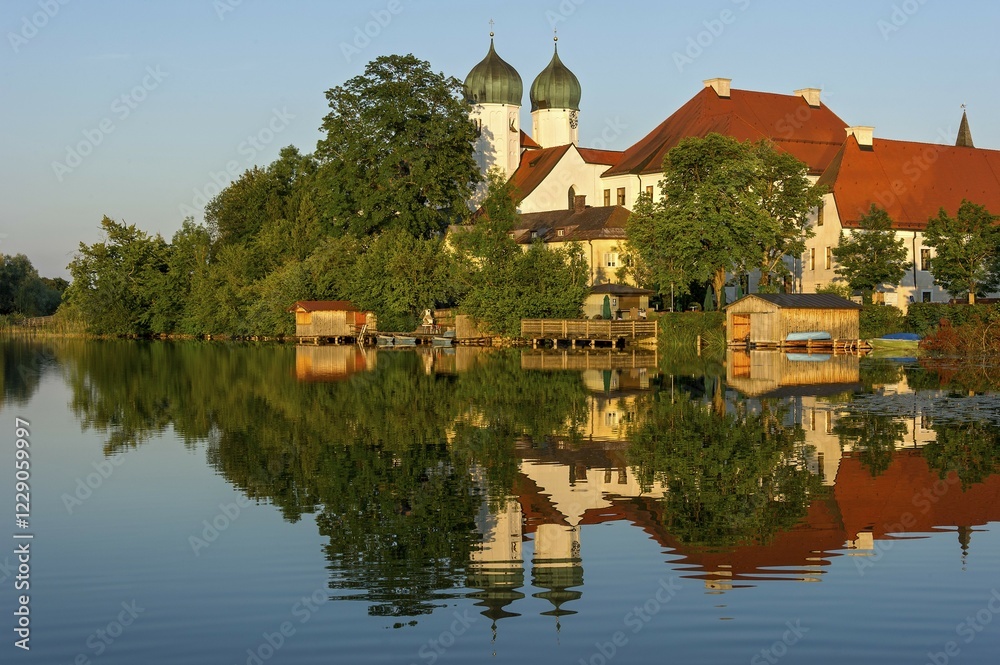 Fototapeta premium Benedictine Kloster Seeon monastery with monastery church of St. Lambert, Klostersee, Seebruck, Chiemgau, Upper Bavaria, Bavaria, Germany, Europe