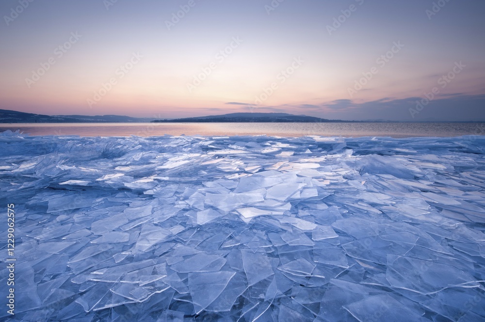 Fototapeta premium Stacked sheets of ice on the shore of the island of Reichenau, Lake Constance, Konstanz district, Baden-Wuerttemberg, Germany, Europe
