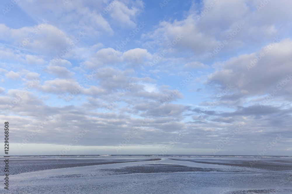 Fototapeta premium Low tide in the Lower Saxon Wadden Sea National Park, Langeoog Island, East Frisia, North Sea Coast, Lower Saxony, Germany, Europe
