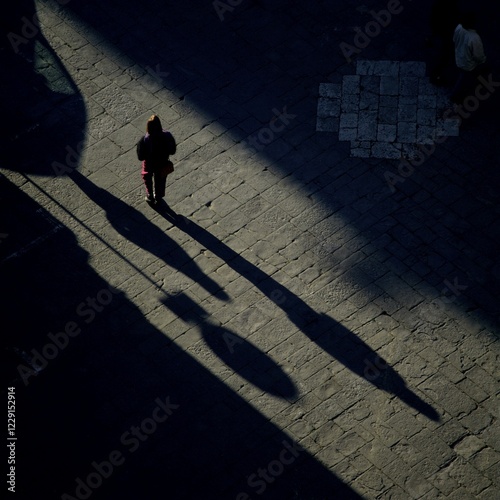 Shadow on the Piazza del Duomo, Siena, Tuscany, Italy, Europe photo