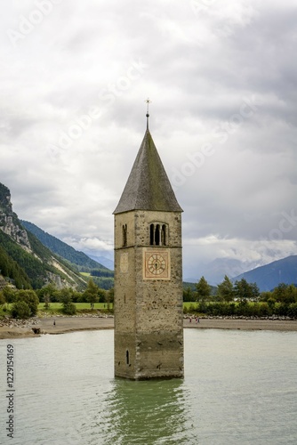 Church tower of Alt-Graun in the Reschensee reservoir, Graun in Vinschgau, South Tyrol Province, Trentino-South Tyrol, Italy, Europe photo