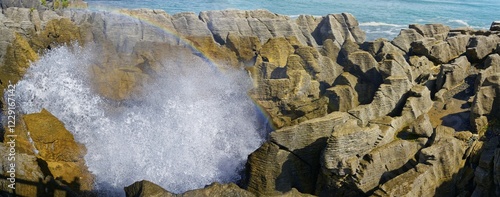 Pancake Rocks, surf, spray coming out of blowhole, Paparoa National Park, West Coast, South Island, New Zealand, Oceania photo