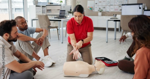 First aid, cpr training and people with mannequin for safety compliance or healthcare. Paramedic course, medical demonstration and teaching emergency rescue technique with hand in business office photo