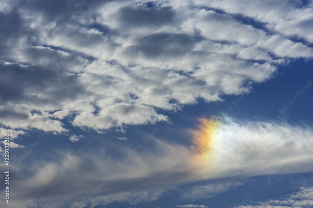 Obraz premium Colored sun reflection on a cloudy sky, Germany, Europe