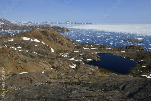 Polar stream of icebergs and pack ice, drift ice, east of Ammassalik and Kulusuk Island, Kalaallit Nunaat, East Greenland, Greenland, Greenland, North America photo