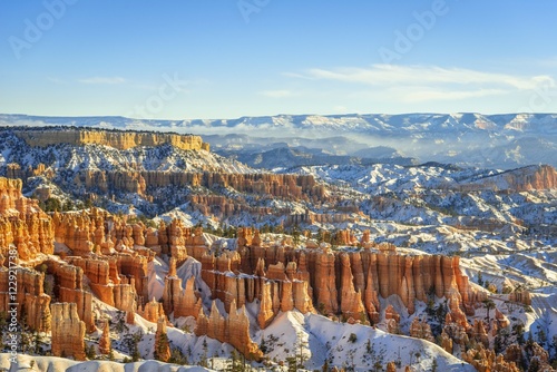 Morning light, snow-covered bizarre rocky landscape with Hoodoos in winter, Sunset Point, Bryce Canyon National Park, Utah, USA, North America