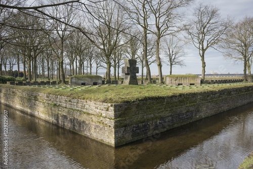 German military cemetery Langemark, with moat and large stone cross, First World War, Langemark Poelkapelle, West Flanders, Flanders, Belgium, Europe photo