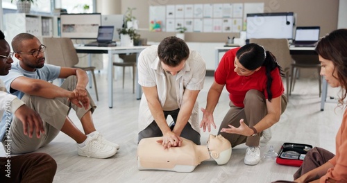 Obraz na płótnie First aid, learning cpr and group with dummy for safety compliance, health and chest compression for breathing
