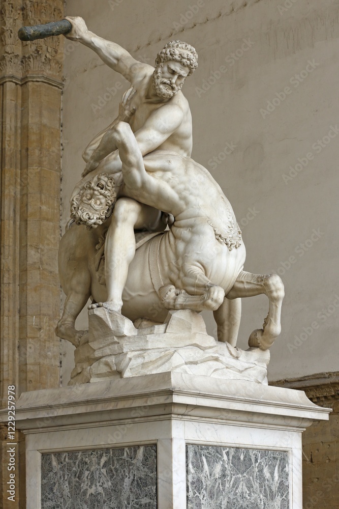 Marble statue Hercules and Nessos in the hall Loggia dei Lanzi, Piazza della Signoria, Old Town, Florence, Tuscany, Italy, Europe Marble statue Hercules and Nessos in the hall Loggia dei Lanzi, Piazza della Signoria, Old Town, Florence, Tuscany, Italy, Europe