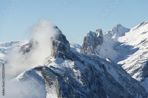 A cloud hanging next to Staubernkanzel mountain, 1860m, Kreuzberge mountains at the back, canton of Appenzell Innerrhoden, Switzerland, Europe photo