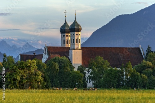 Basilica of St Benedict, Benedictine monastery Benediktbeuern, rear right Herzogstand of the Alps, in the back Arnspitze Group in Wetterstein range of  the Alps, Benediktbeuern, Upper Bavaria, Bavaria, Germany, Europe photo