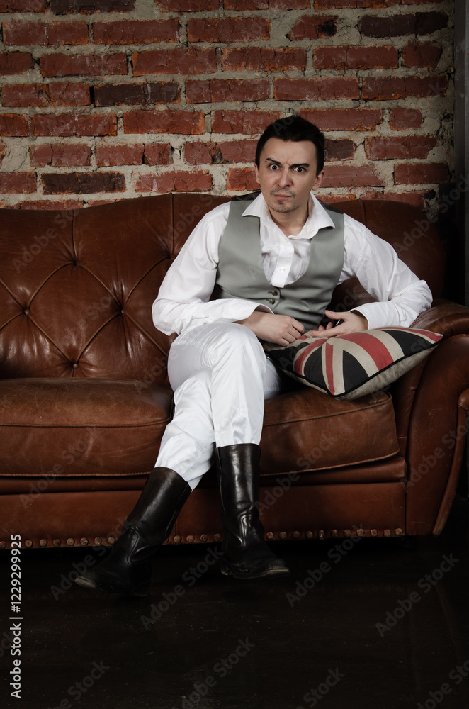 Young attractive aristocrat posing in the studio. Young attractive aristocrat posing in the studio.