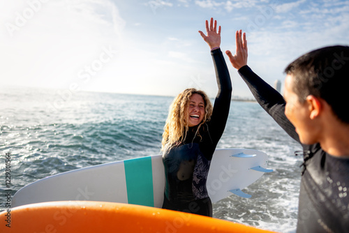 Photography Young people having fun, enjoying their vacations outdoors at the beach with surfboards