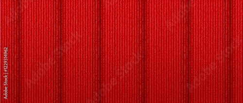 Close-up of vibrant red fabric with vertical ribbed texture, showcasing intricate woven details.