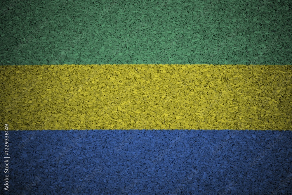 The Gabonese flag painted on a cork board The Gabonese flag painted on a cork board