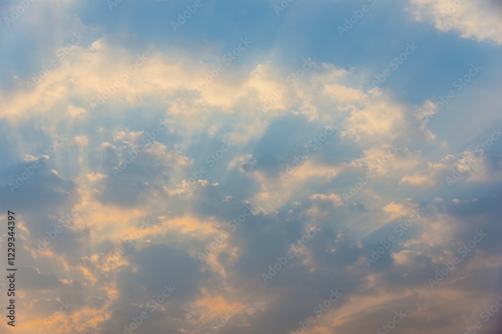 Fototapeta premium Sky, small clouds and sun rays, dawn, morning light, full frame