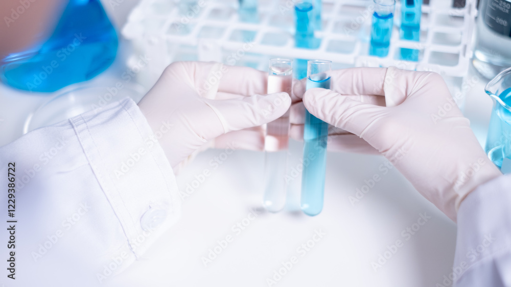 Scientist compare difference between two test tubes laboratory science research chemistry chemical