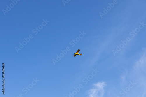 Superlight private plane flies in the sky