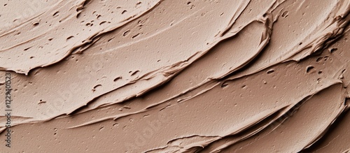 Smeared brown cosmetic clay mud mask.