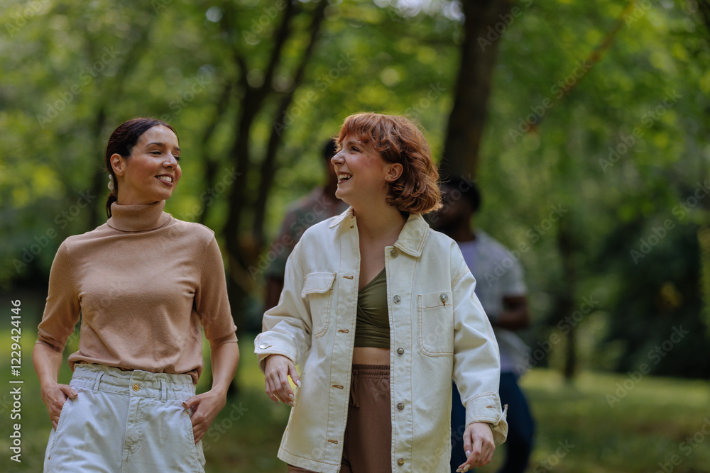 Two fashionable girls in a park Two fashionable girls in a park