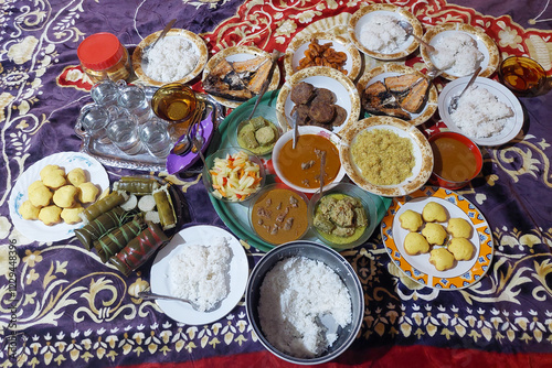 Various Eid cakes in plastic jars ready to be eaten