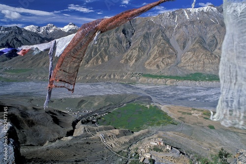 Prayer flags, view across the Spiti Valley, Buddhist Ki or Key Monastery or Gompa, Lahaul and Spiti district, Himachal Pradesh, Indian Himalayas, North India, India, Asia photo