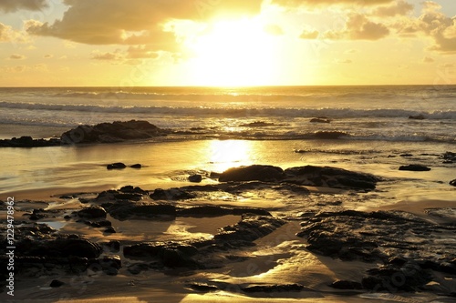 Sunset and clouded sky reflected in the Atlantic Ocean, Fuerteventura, Canary Islands, Spain, Europe