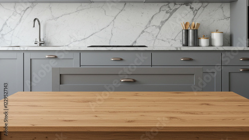 Front view of elegant interior with gray drawers under kitchen cabinet. empty wooden table and marble countertop in room. modern equipment for cooking. well organized space for storage food products